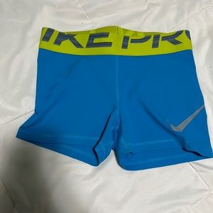 Light blue and neon Nike pro spandex